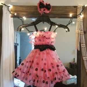 Pink and black polka dot dance costume